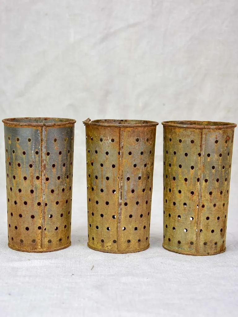 Collection of three tin cheese molds / faisselles