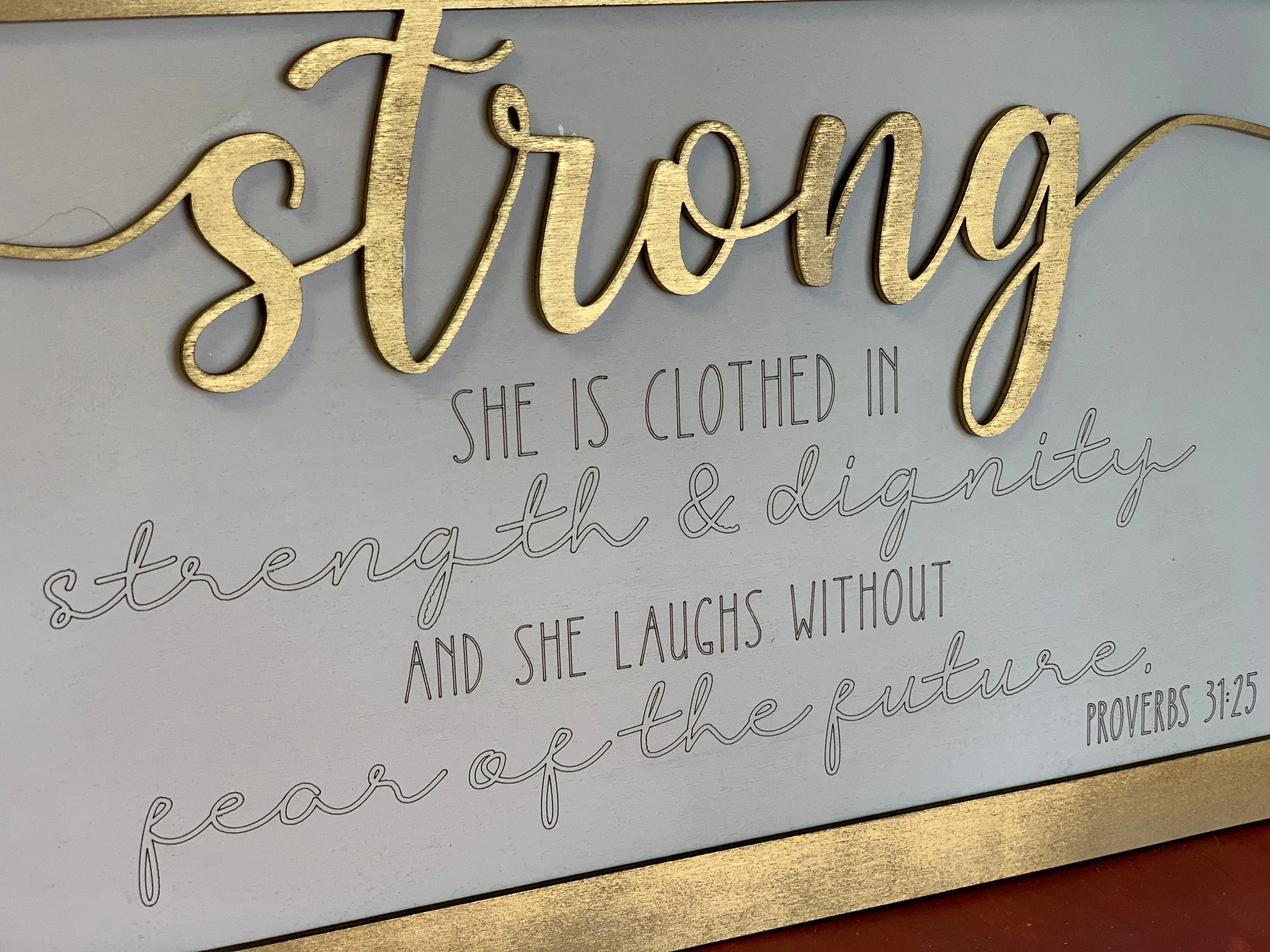 Layered Quote: She is clothed in Strength and Dignity, Strong